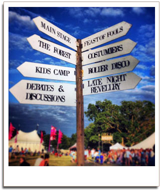Alternative Festival weddings signpost set against a blue sky
